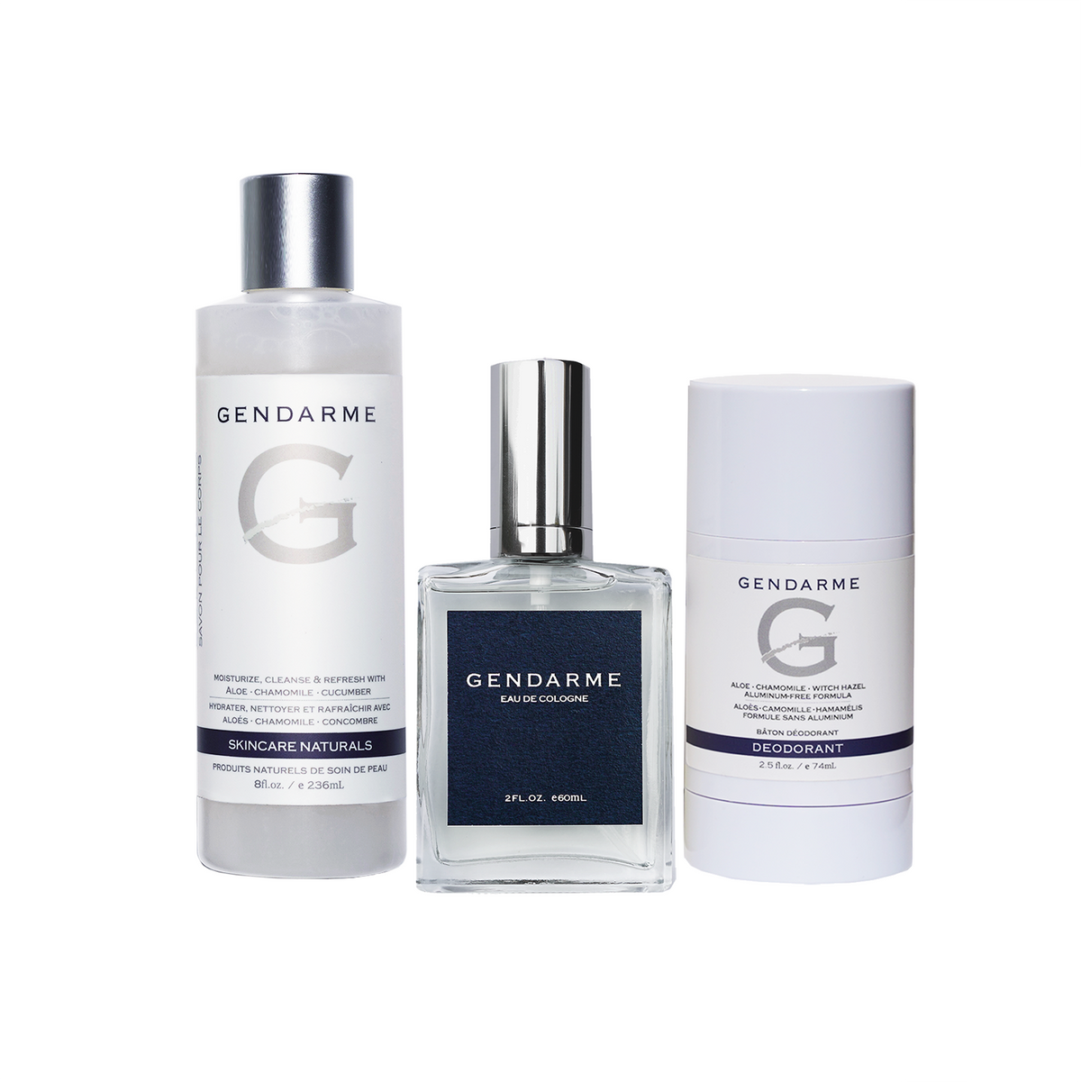 Three Gendarme skincare and fragrance products on a white background. includes 8oz bottle of body wash, 2oz glass bottle of gendarme etc, and deodorant