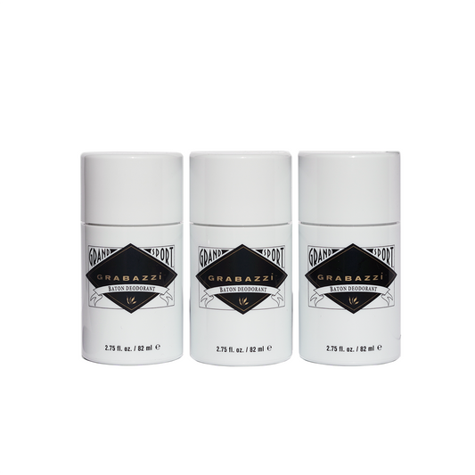 Three white grabazzi bottles with black labe
