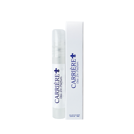 A travel spray bottle of Carrière Eau De Parfum with its packaging box, featuring white color with blue brand logo and floral design elements.
