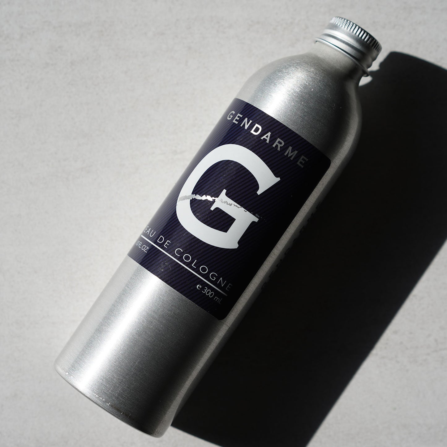Decorative Image of Gendarme 10oz Refill Aluminum Can with Screw cap, Dark blue label with logo