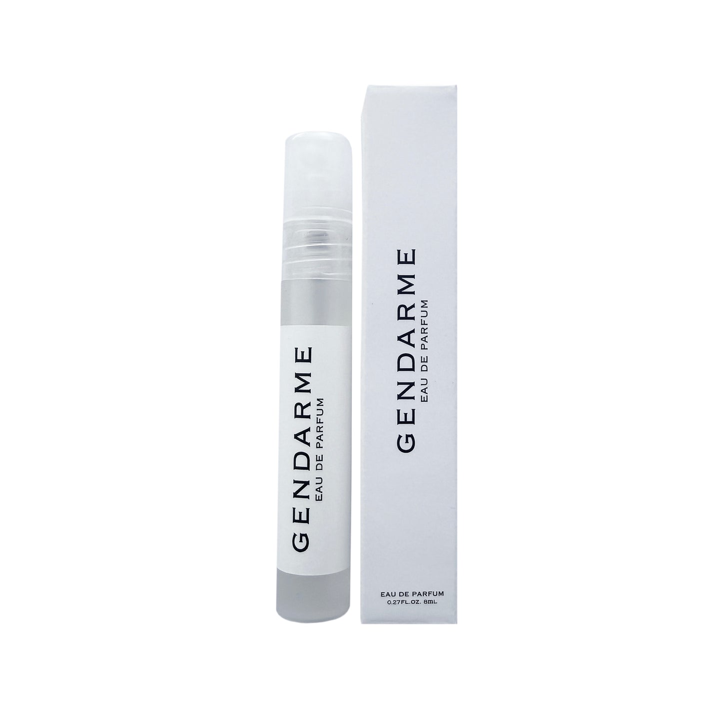Travel size plastic atomizer near white box both with white label reading " GENDARME EAU DE PARFUM" 
