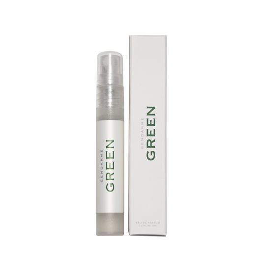 A travel spray bottle of Gendarme Green Eau De Parfum next to its packaging box.