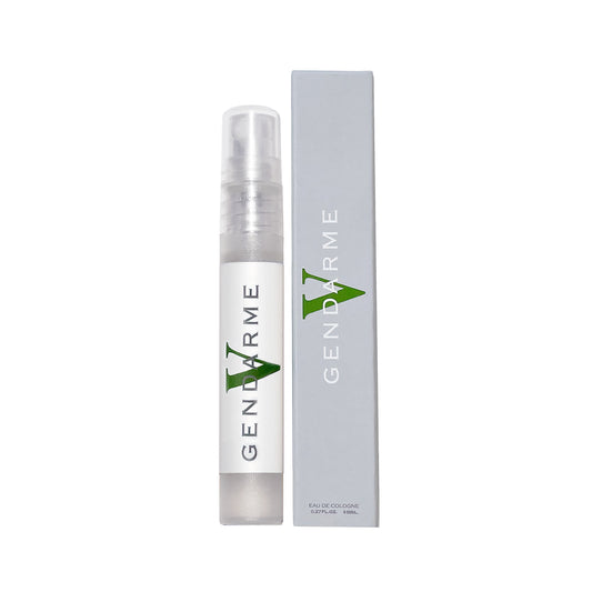 A clear plastic .27oz atomizer perfume spray bottle with a white label and green logo, standing next to its tall light gray box. The label and box are both printed with the brand name 'GENDARME' in vertical text with a green stylized 'G' logo