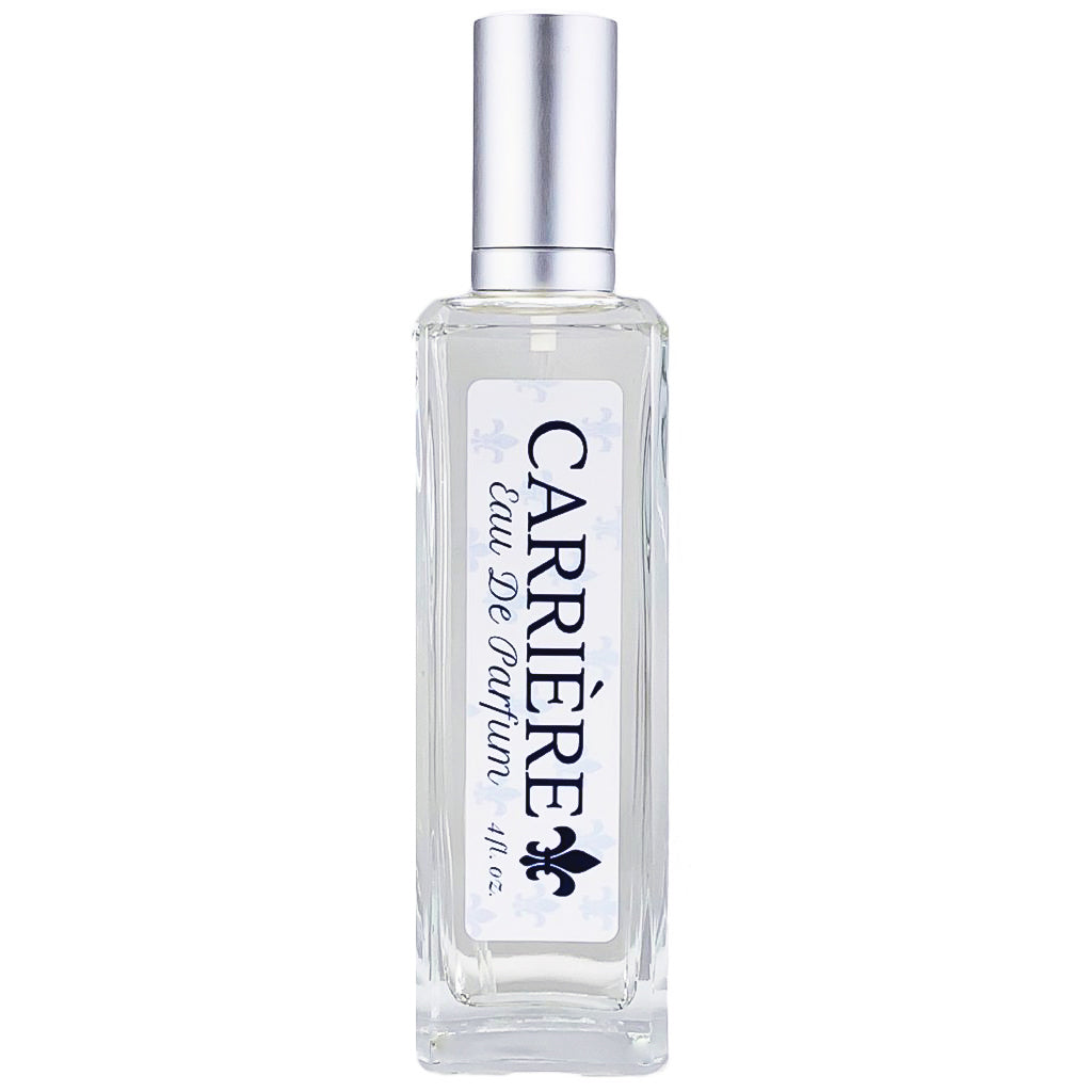 A clear glass bottle of Carrière Eau De Parfum with a white label and a silver cap.
