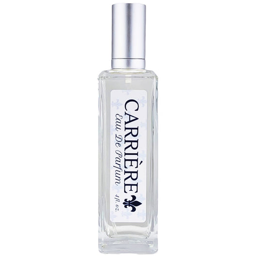 A clear glass bottle of Carrière Eau De Parfum with a white label and a silver cap.